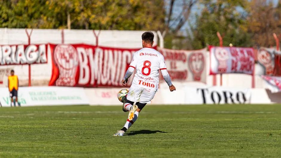 Forward in action during a football match — goalscorer prediction tips